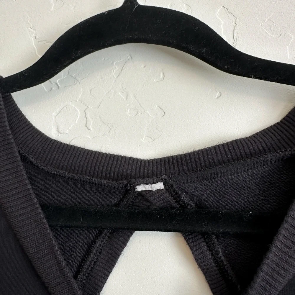 Alo Yoga | Intricate Long Sleeve Keyhole Cutout Yoga Tee Top in Black